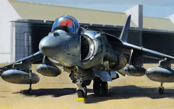 A detailed HD desktop wallpaper featuring a military jet fighter positioned on the tarmac, showcasing its sleek design and armaments against a backdrop of hangars.