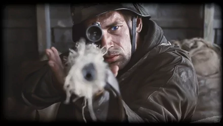 A soldier with a sniper rifle aims intently, capturing the intensity of World War II. Inspired by Saving Private Ryan, this HD wallpaper evokes military valor and determination.