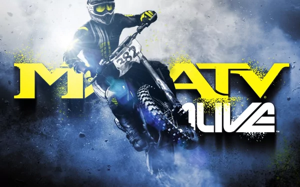 HD PC desktop wallpaper featuring a motocross rider in action from the video game MX vs. ATV Alive with bold yellow and white game title text.