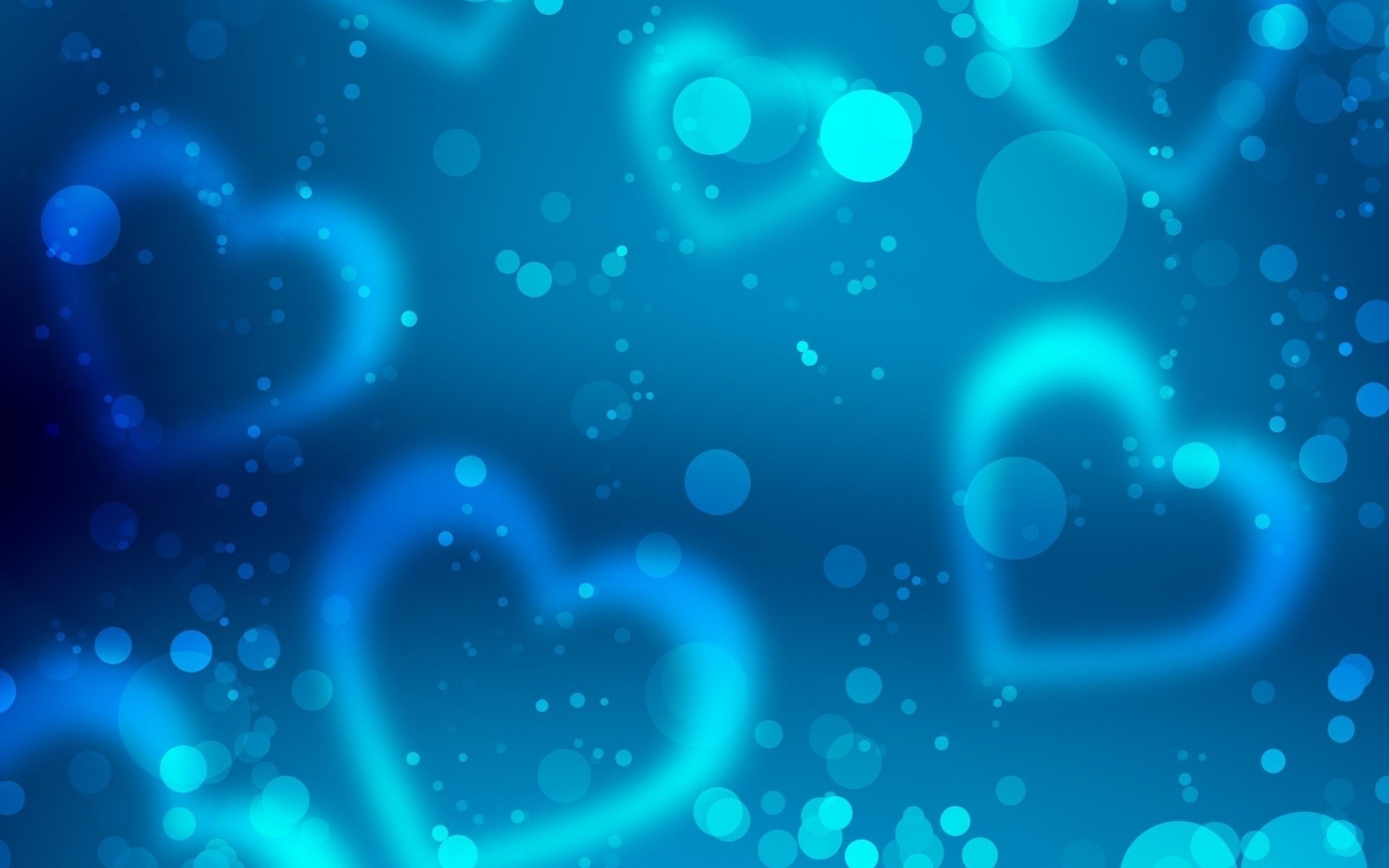 An abstract blue wallpaper featuring soft heart shapes and bokeh effects, creating a tranquil and visually engaging background for HD screens.