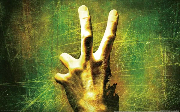 A close-up of a hand forming a peace sign, set against a textured green background. This HD wallpaper features imagery inspired by the video game Left 4 Dead 2.