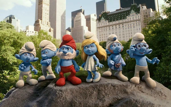 HD desktop wallpaper of The Smurfs movie featuring six Smurfs characters standing on a rock with a cityscape background.