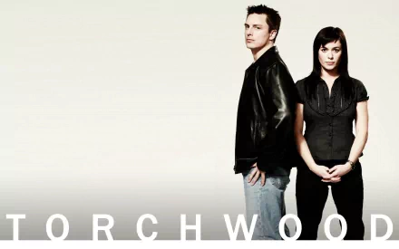 HD desktop wallpaper featuring two main characters from the TV show Torchwood against a minimalistic light background with the show's title at the bottom.