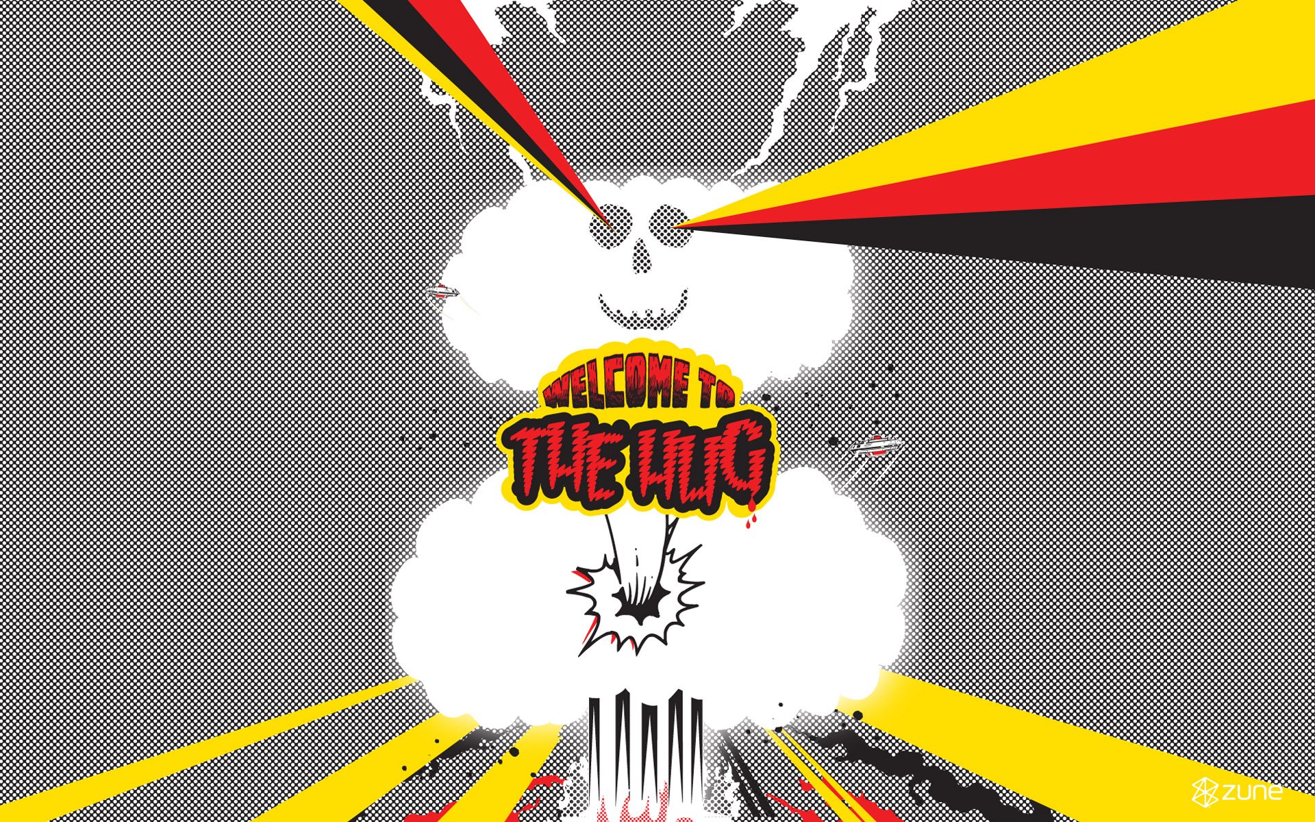 HD PC desktop wallpaper featuring a stylized man-made explosion with bold red, yellow, and black rays, and “Welcome to the HUG” text, tagged Zune.