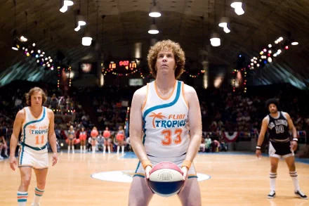 Still from Semi-Pro: 1970s basketball court, player in #33 Tropics uniform shoots a free throw while teammates and opponents look on — 2K Quad HD PC wallpaper.