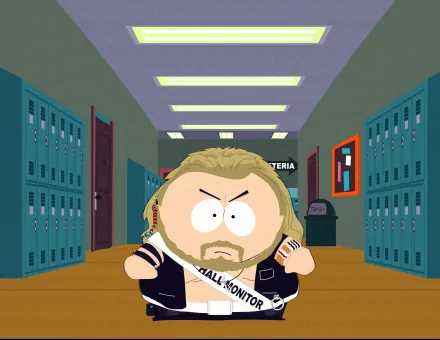 Cartman from the TV show South Park stands confidently in a school hallway, wearing a hall monitor sash, creating an engaging HD desktop wallpaper and background.