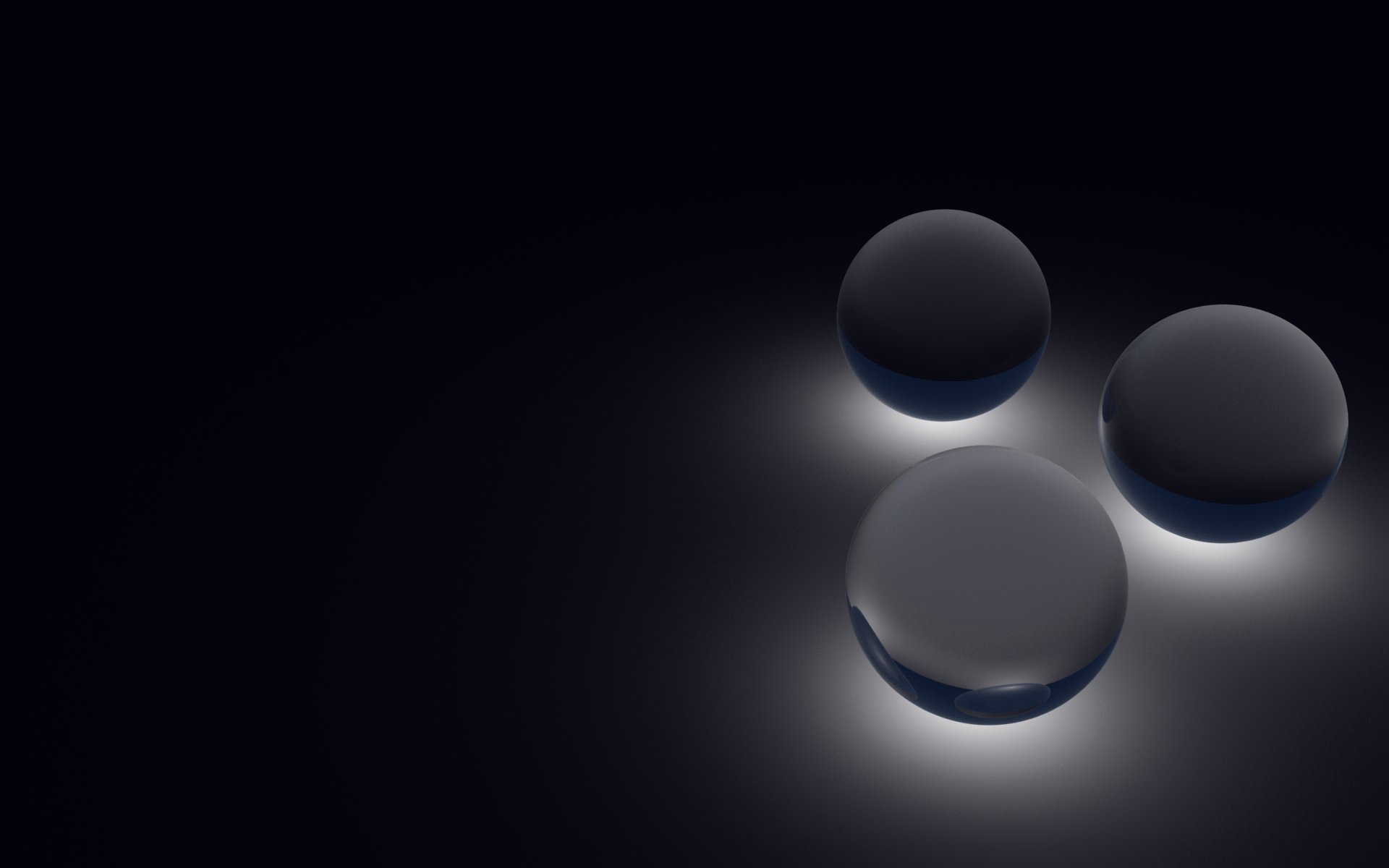 Abstract spheres softly illuminated against a dark background, creating a sleek and modern aesthetic. This high-definition image serves as a striking desktop wallpaper.