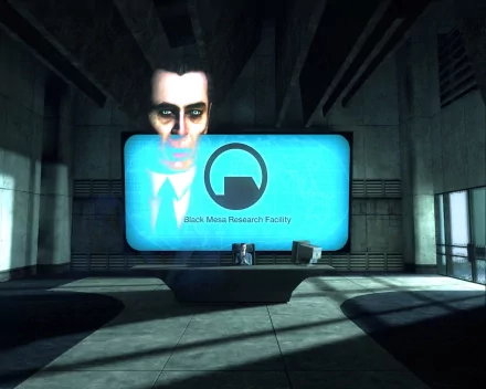 HD PC desktop wallpaper featuring the G-Man from the Half-Life video game, with a Blue Mesa Research Facility screen in a dimly lit industrial setting.