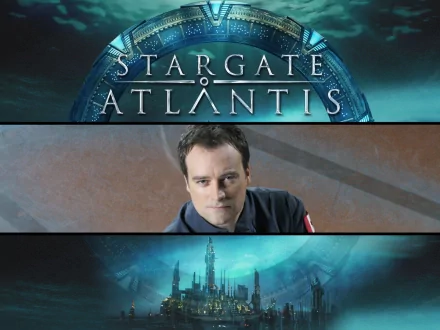 David Hewlett as Rodney McKay from the TV show Stargate Atlantis is featured in this HD desktop wallpaper, showcasing the iconic series logo and a stunning background of Atlantis.