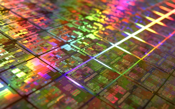 HD desktop wallpaper featuring a close-up of a colorful computer circuit board, showcasing intricate technology and hardware design.