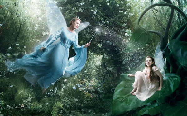 HD Disney Dream Portraits wallpaper featuring a fairy in a flowing blue dress casting magic toward a seated girl surrounded by lush forest foliage.