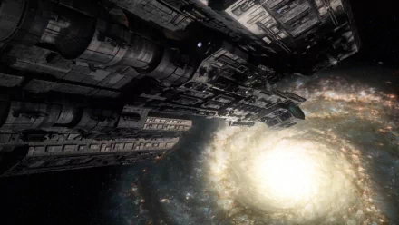 A stunning HD desktop wallpaper featuring a spacecraft from Stargate SG-1, set against a backdrop of a swirling galaxy and bright celestial light.