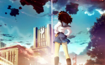 A vibrant HD desktop wallpaper featuring Haruhi Suzumiya in her school uniform, standing against a dramatic sky, from the anime The Melancholy of Haruhi Suzumiya.