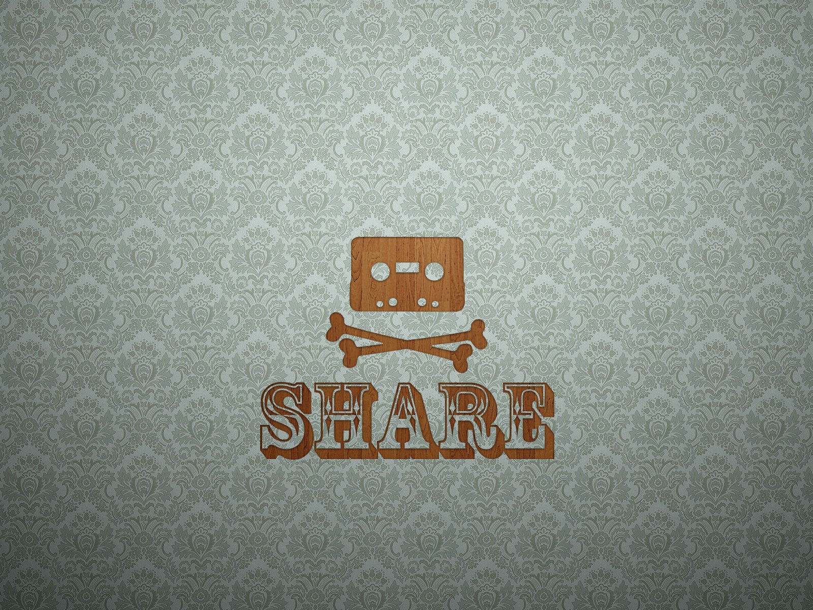 HD PC desktop wallpaper featuring a stylized hacker-themed design with a cassette tape skull and crossbones above the word SHARE, blending technology and vintage elements.