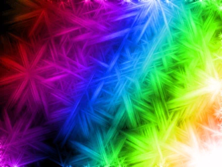 An HD abstract desktop wallpaper featuring a vibrant spectrum of colors ranging from red and purple on the left to blue, green, and yellow on the right, with a cool, geometric pattern.