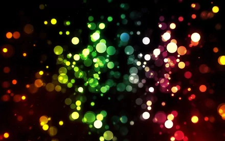 HD desktop wallpaper and background with an artistic bokeh effect, featuring colorful, out-of-focus light spots against a dark backdrop, creating a vibrant and dynamic visual experience.