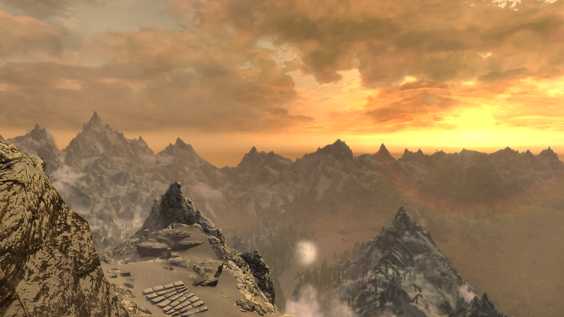 A breathtaking HD wallpaper from The Elder Scrolls V: Skyrim, showcasing majestic mountains against a dramatic sunset sky, capturing the enchanting beauty of the game world.