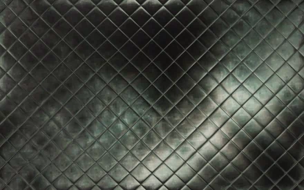 Abstract pattern featuring a dark, quilted design, creating a textured look. This HD wallpaper serves as a striking background for PC desktops.