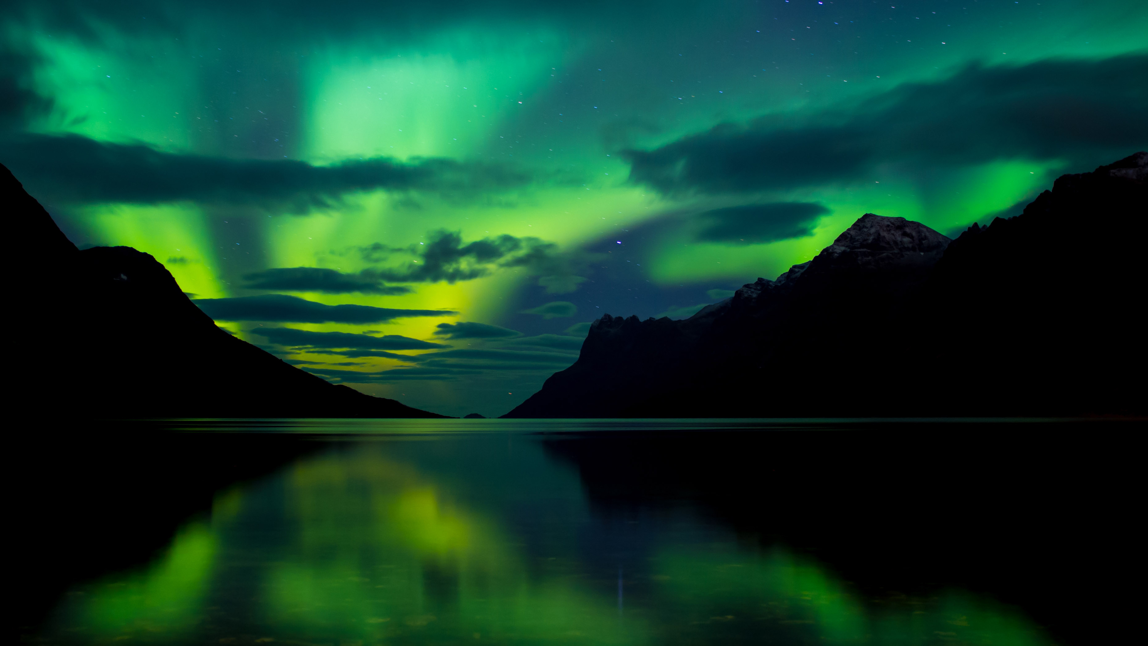 Colorful Aurora Borealis Northern Lights. Streaming color over winter  landscape. Mountains, trees, lake at night. Natural wonders background  wallpaper Ai generated image Stock Illustration | Adobe Stock