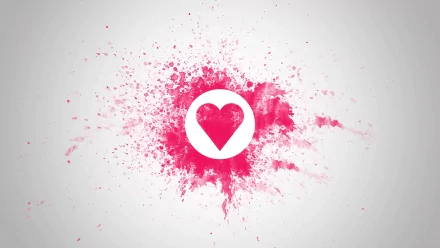 HD desktop wallpaper with an artistic splash of pink surrounding a white heart, symbolizing love.
