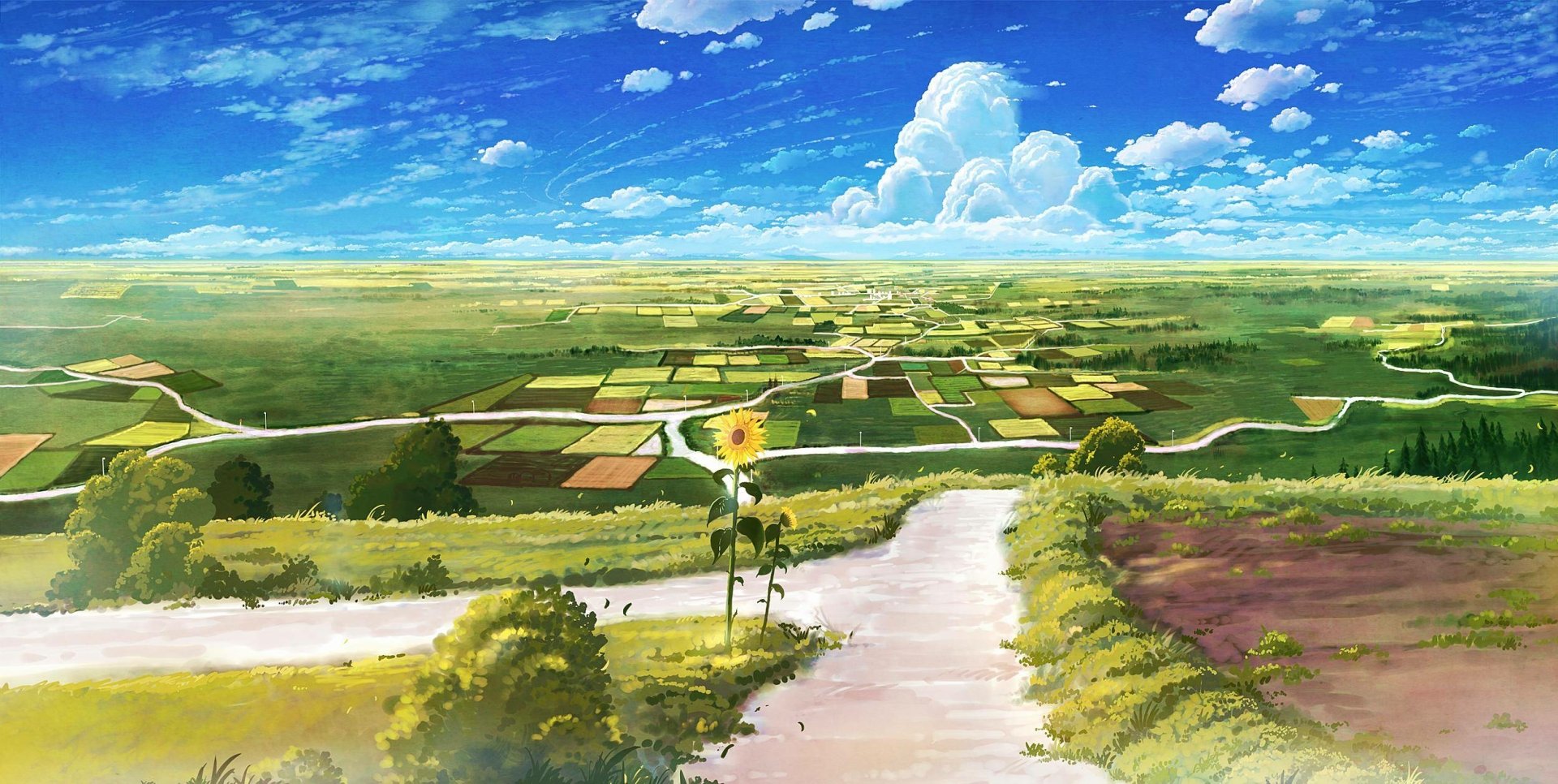 A vibrant anime landscape featuring rolling fields, a winding road, and a bright blue sky adorned with fluffy clouds, designed as an HD PC desktop wallpaper and background.