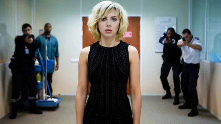 Scarlett Johansson in a scene from the movie Lucy, featured in a 4K Ultra HD PC desktop wallpaper and background.