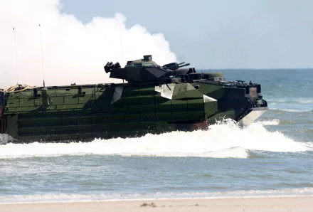 HD wallpaper of a military amphibious assault vehicle carrying Marines, navigating the waters off Mayport Beach.