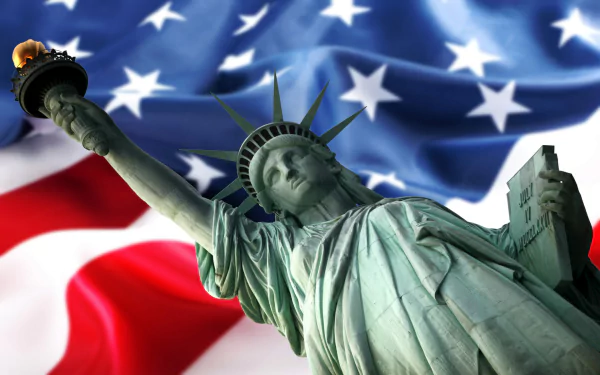 HD desktop wallpaper featuring the Statue of Liberty against a waving American flag, celebrating Presidents' Day in the USA.