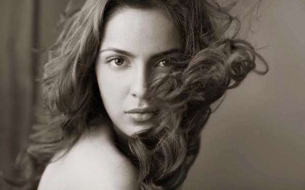 Monochrome close-up of Bollywood celebrity Shazahn Padamsee with flowing curls, captured in an HD PC desktop wallpaper and background.