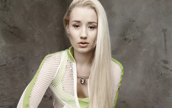 HD desktop wallpaper featuring a person with long blonde hair in a green mesh garment against a grey textured background.