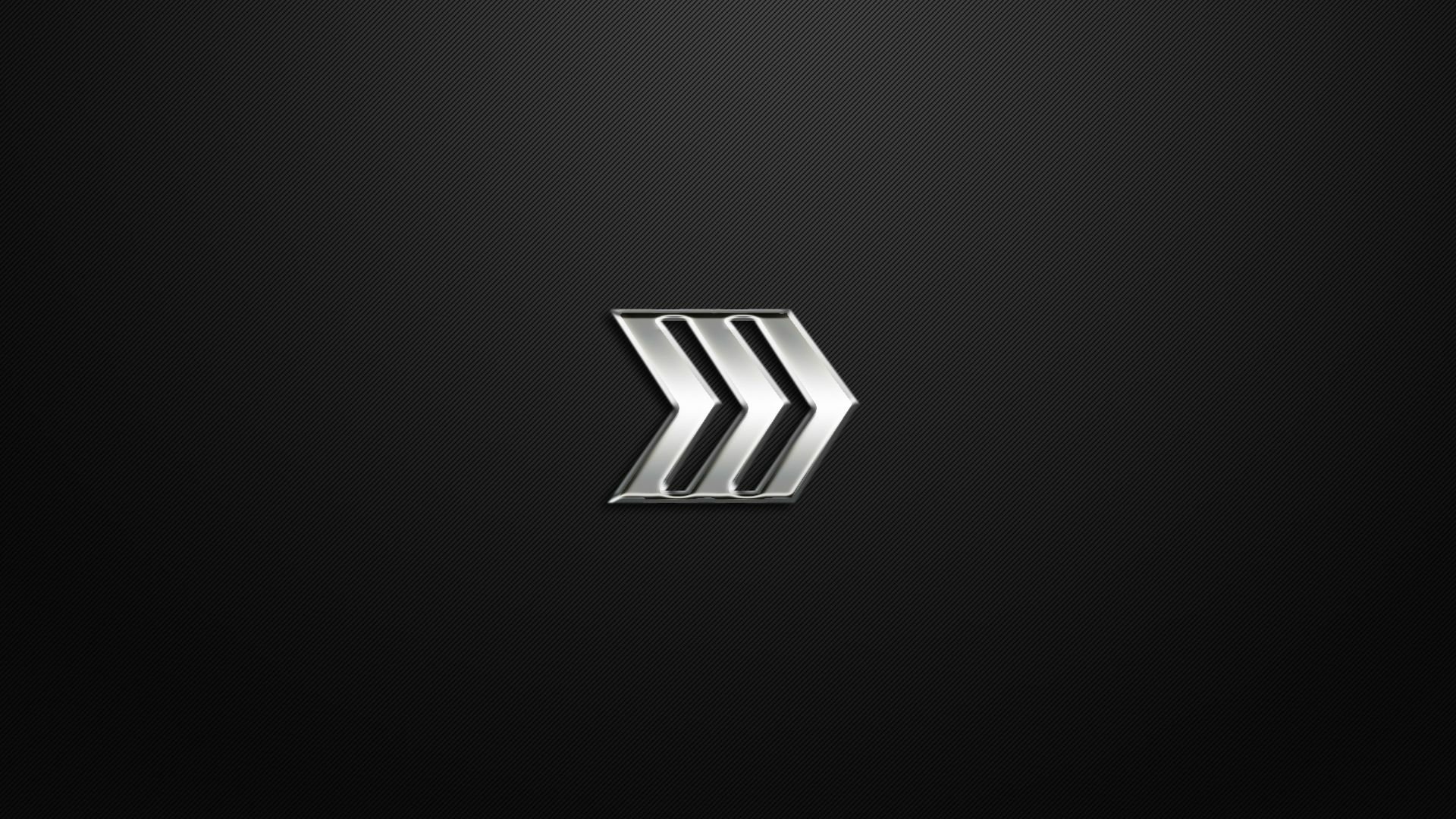 HD PC desktop wallpaper featuring the sleek, metallic double arrow logo from the video game Counter-Strike: Global Offensive on a dark background.