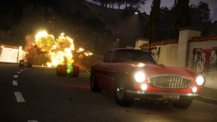 HD PC desktop wallpaper from the video game Just Cause 3 showing a red vintage car driving on a road with explosions in the background at night.