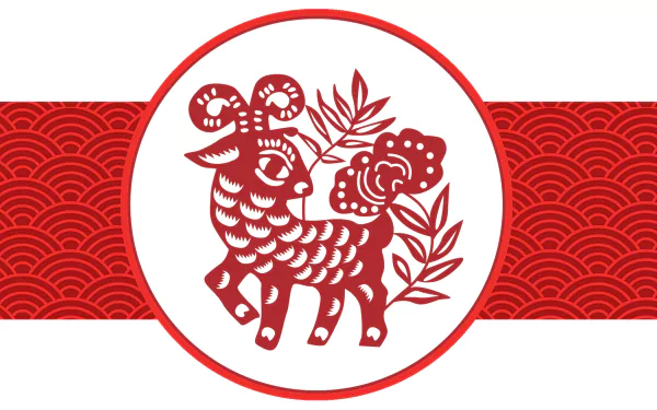 HD PC desktop wallpaper featuring a red paper-cut style goat design with floral elements, celebrating Chinese New Year and holiday traditions.