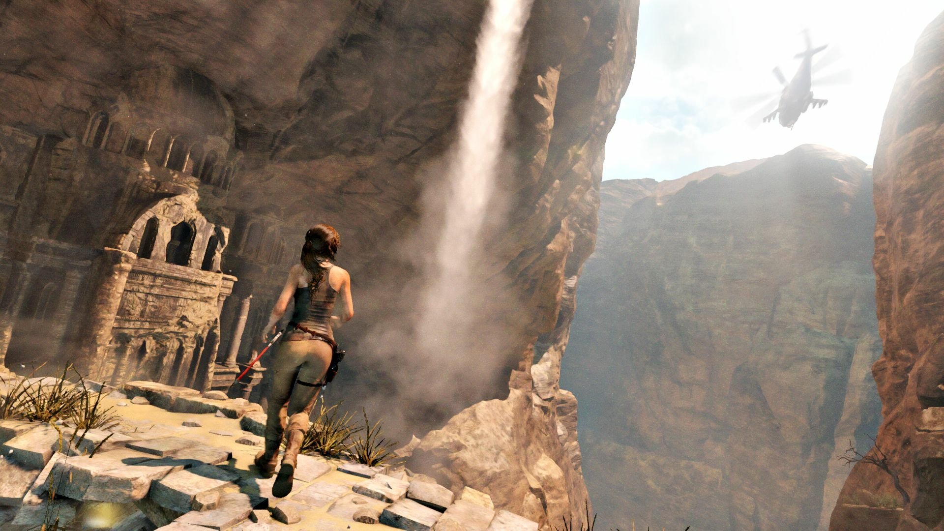 Lara Croft explores a breathtaking landscape in Rise of the Tomb Raider, showcasing stunning visuals and adventure elements in this HD PC desktop wallpaper.