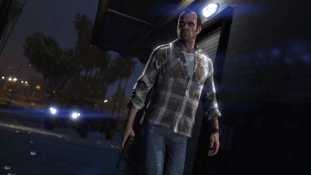Trevor Philips stands in a dimly lit setting, holding a gun, showcasing intense detail in this 4K Ultra HD wallpaper from the video game Grand Theft Auto V.