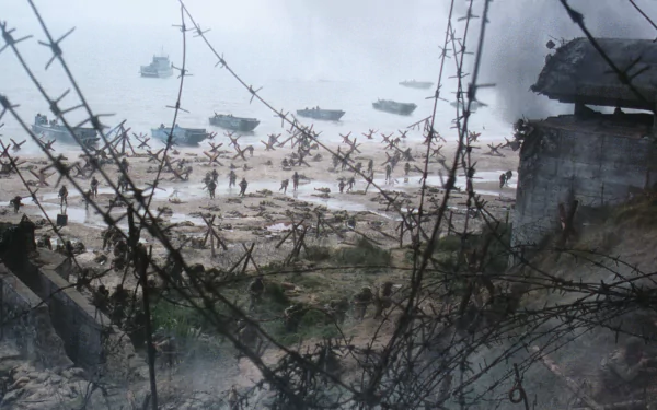 A dramatic scene from Saving Private Ryan depicting soldiers landing on a beach under artillery fire, with barbed wire and landing boats in a misty atmosphere. HD desktop wallpaper.