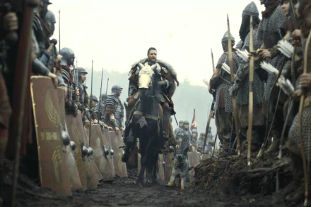 HD desktop wallpaper featuring a scene from the movie Gladiator with Russell Crowe on a horse, surrounded by armored soldiers.