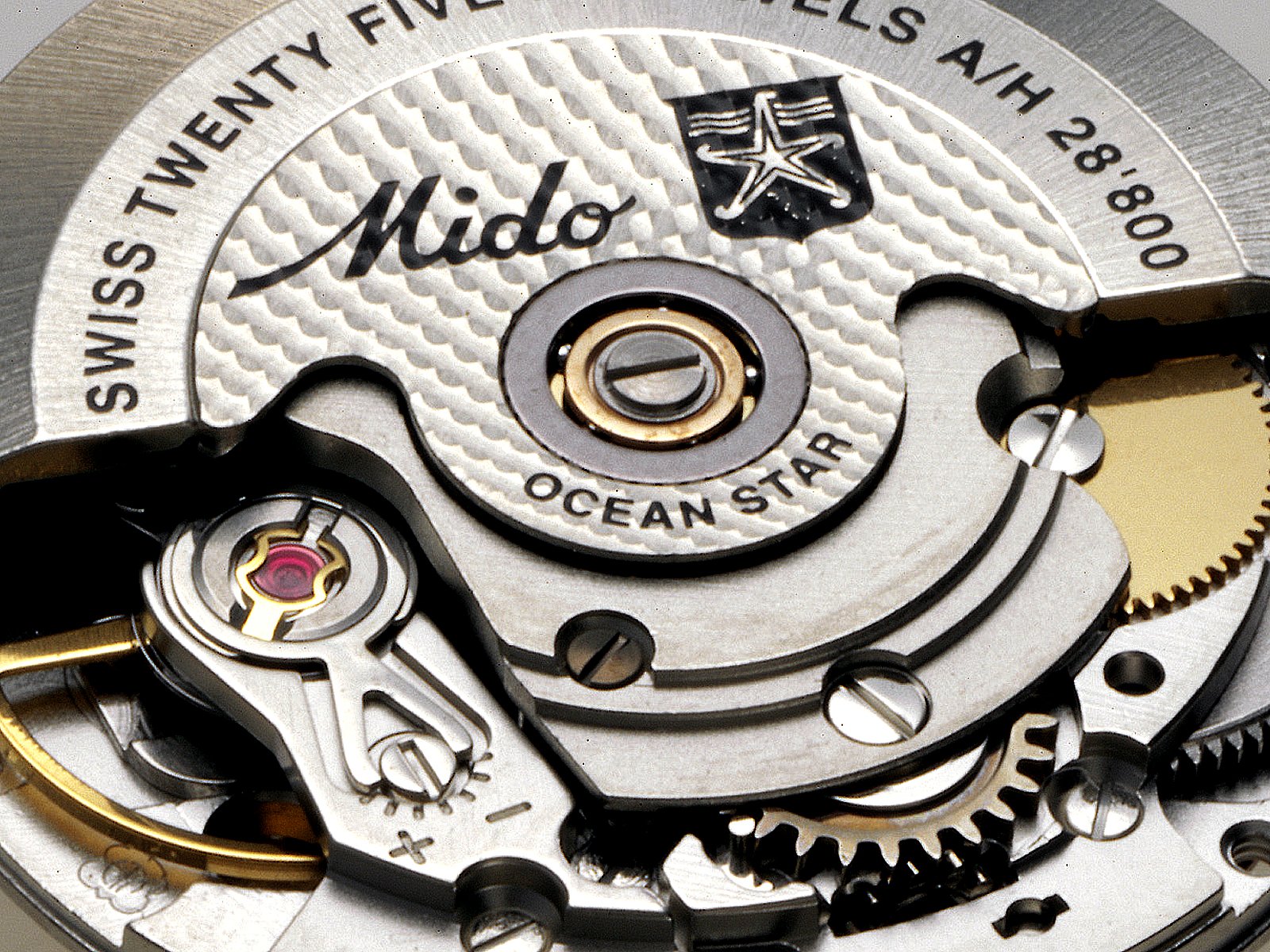 A close-up of a mechanical watch movement showcasing intricate metal components, representing the fusion of technology and hardware in precision engineering.