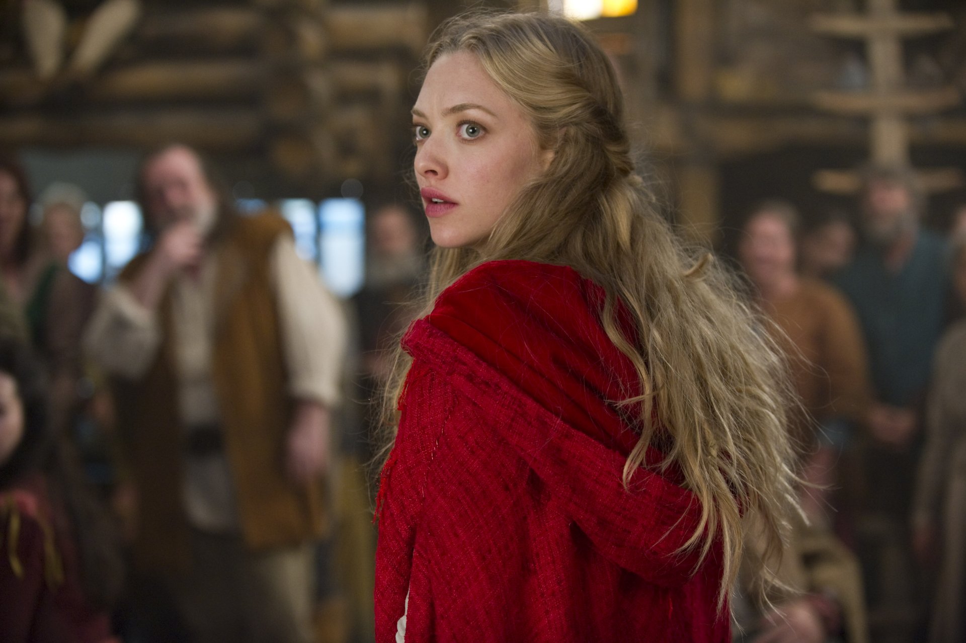 Amanda Seyfried in a scene from the movie Red Riding Hood, featured in a 4K Ultra HD PC desktop wallpaper and background.