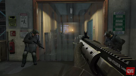 HD PC wallpaper from Grand Theft Auto V showing a tense heist scene with armed characters in tactical gear inside a dimly lit industrial setting.