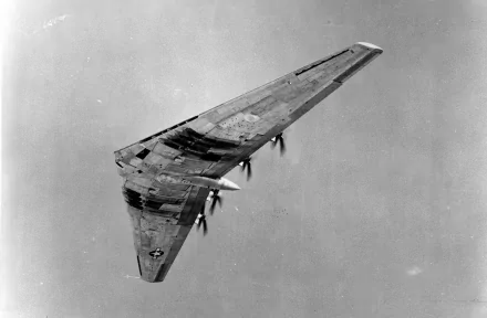 Monochrome view of a military Northrop YB-35 flying wing airborne, presented as an HD PC desktop wallpaper and background.