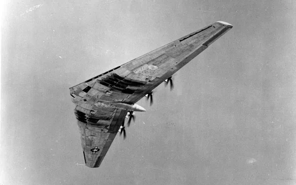 Monochrome view of a military Northrop YB-35 flying wing airborne, presented as an HD PC desktop wallpaper and background.