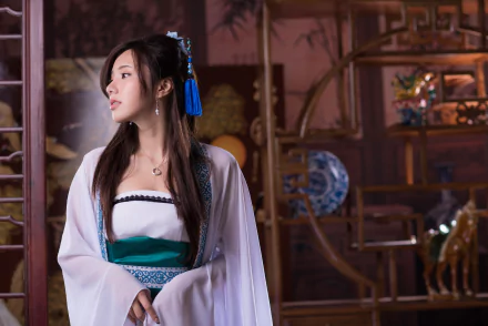 A Taiwanese model, Chén Sīyǐng, poses gracefully in traditional attire, set against an ornate backdrop, captured in stunning 4K Ultra HD detail.