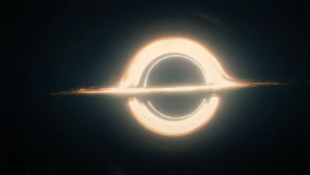 A stunning HD desktop wallpaper featuring a black hole from the movie Interstellar, showcasing its swirling accretion disk and luminous edges against a dark backdrop.