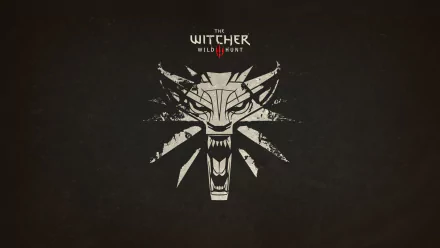 HD desktop wallpaper and background featuring the game The Witcher 3: Wild Hunt with a stark white wolf emblem on a dark background.