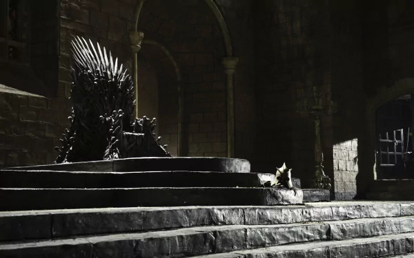 HD wallpaper featuring the Iron Throne from Game of Thrones, set in a dimly lit stone hall, emphasizing the iconic seat of power in the TV show.