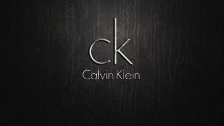 HD PC desktop wallpaper featuring a sleek, man-made Calvin Klein logo on a dark textured background.