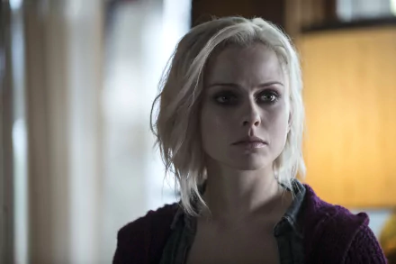 HD PC desktop wallpaper featuring a close-up of the lead character from the TV show iZombie, showcasing her intense expression and muted background lighting.