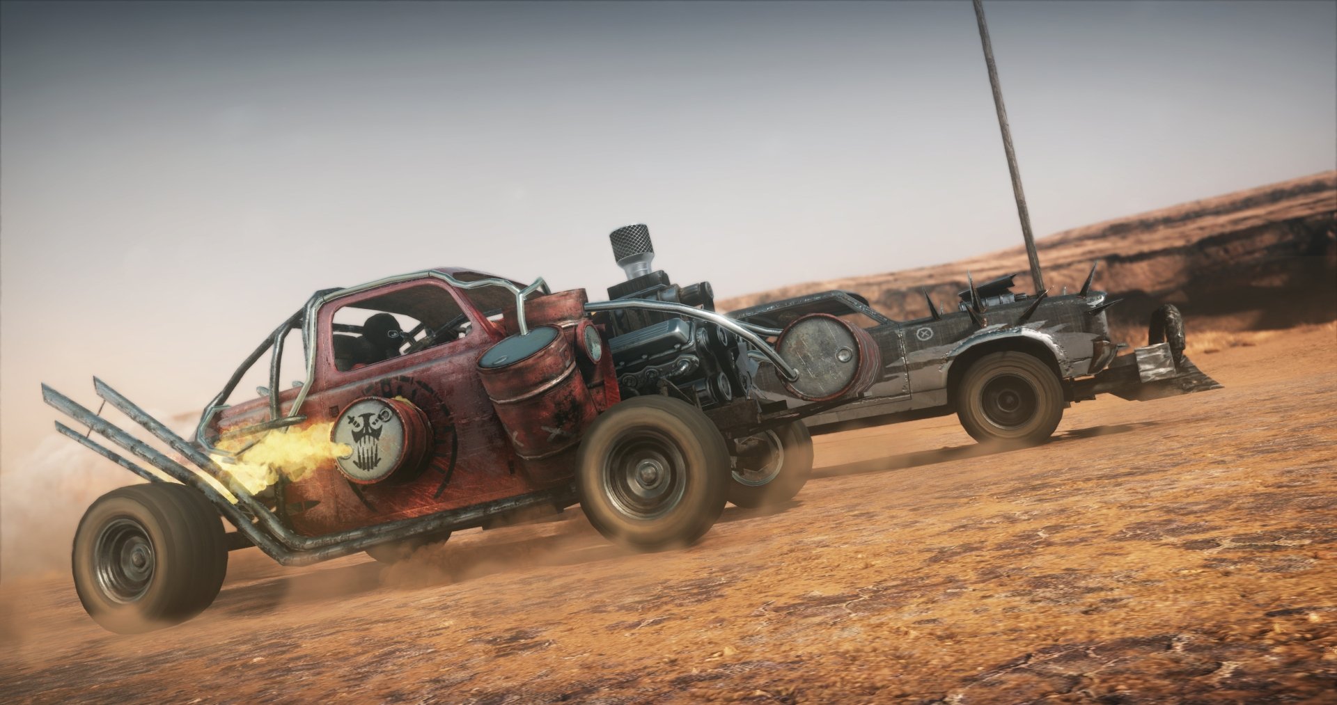 4K Ultra HD PC desktop wallpaper featuring a rugged, post-apocalyptic vehicle from the Mad Max video game racing across a dusty desert landscape.