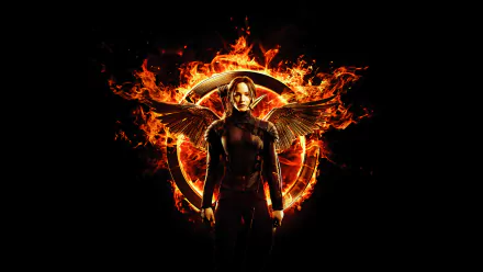 HD PC wallpaper featuring Jennifer Lawrence as Katniss Everdeen with fiery wings and flames, inspired by The Hunger Games: Mockingjay - Part 1 movie.